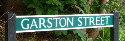 Roadsign with white text on a green background