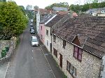 A terrace of stone cottages taken from a high vantage point