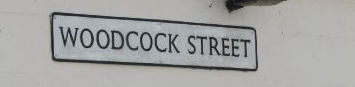 Woodcock Street name sign
