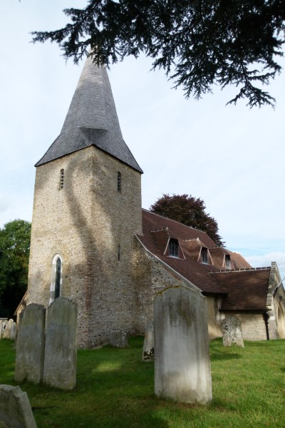 External view of a church with a spire