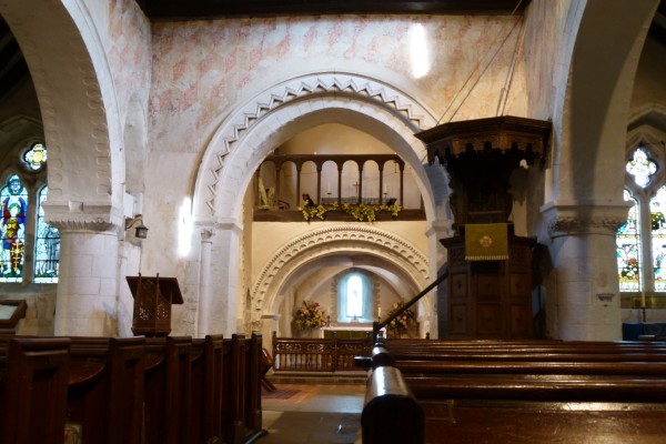 Chancel with early arches and pulpit
